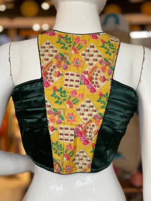 Green halter neck satin blouse with embroidered yellow back patch